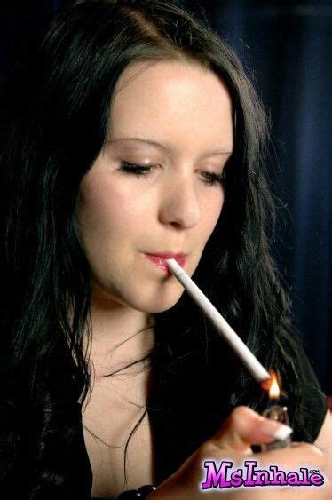 Chloe Dove smoking a 120mm cigarette in a cigarette holder .